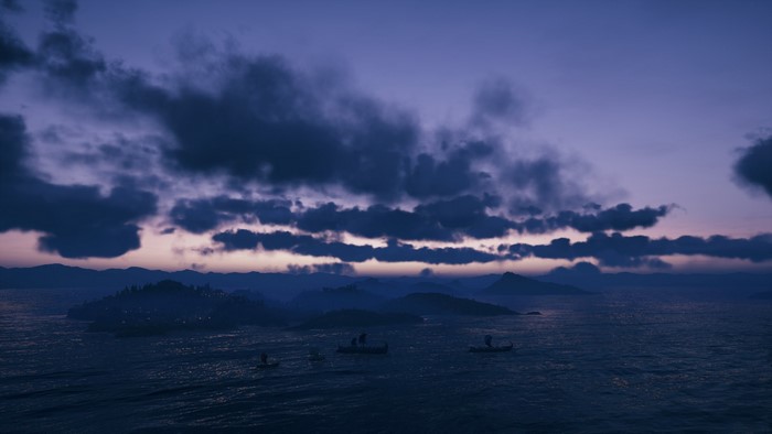 Ships sailing on the sea at sunrise in Assassin's Creed: Odyssey