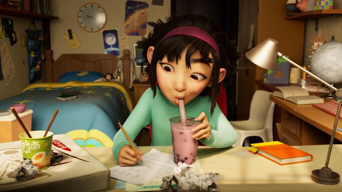 Fei Fei drinks bubble tea in her room