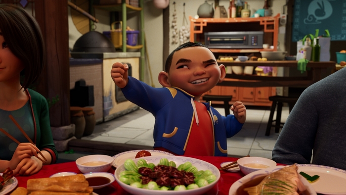 Chin celebrating at a family meal in Over the Moon