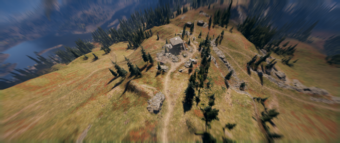 Far Cry 5 mountain outpost with lake in background
