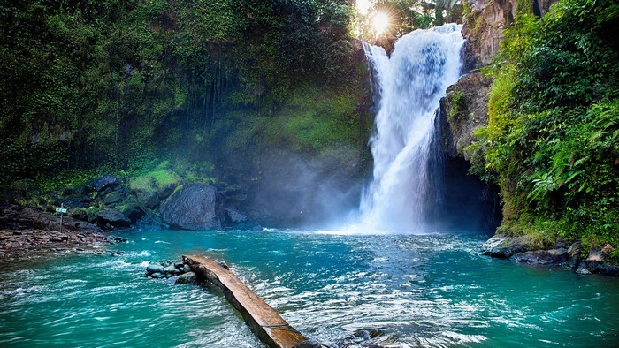 Waterfall in Bali, Indonesia with Sun Rays