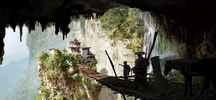 Cave entrance overlooking a mountain landscape with a waterfall and temple