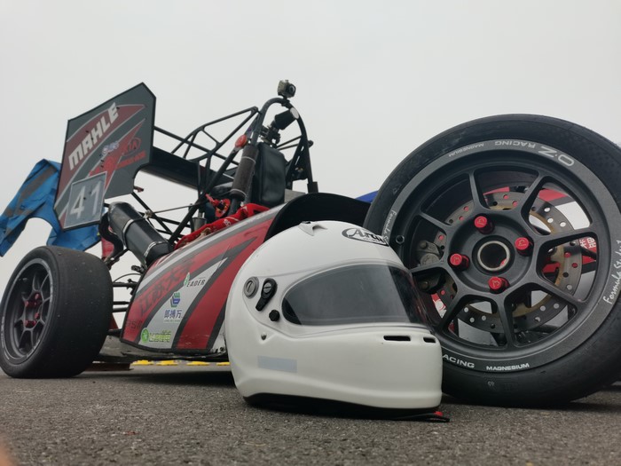 Formula Student Race Car with Helmet and Wheel