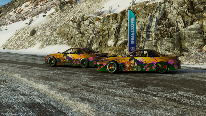 Two anime-styled cars in a snowy mountain race