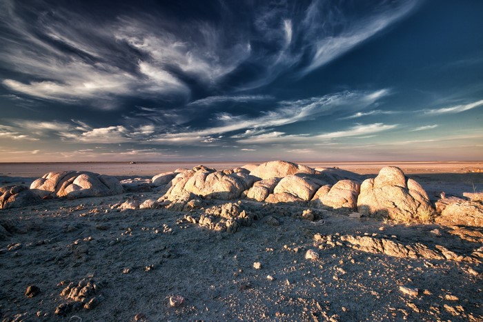 Rocky landscape under a dramatic sky in Botswana