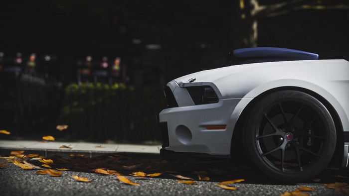 White Ford Shelby GT500 Mustang with hood scoop