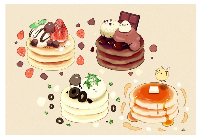 Cute birds and a bee on pancakes