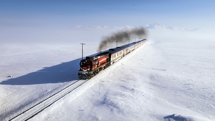 4K Train in Snowy Landscape