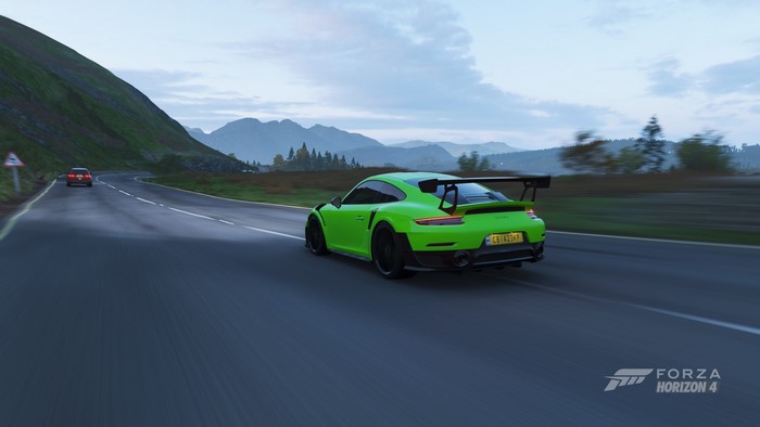 Green Porsche 911 GT2 RS driving in Forza Horizon 4