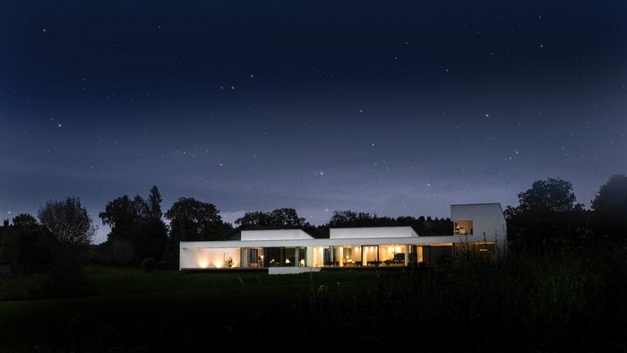 Modern house at night with stars