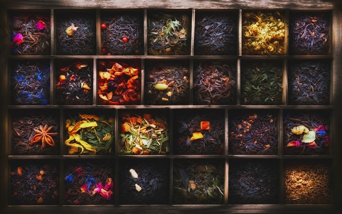 Assortment of loose leaf teas in wooden compartments