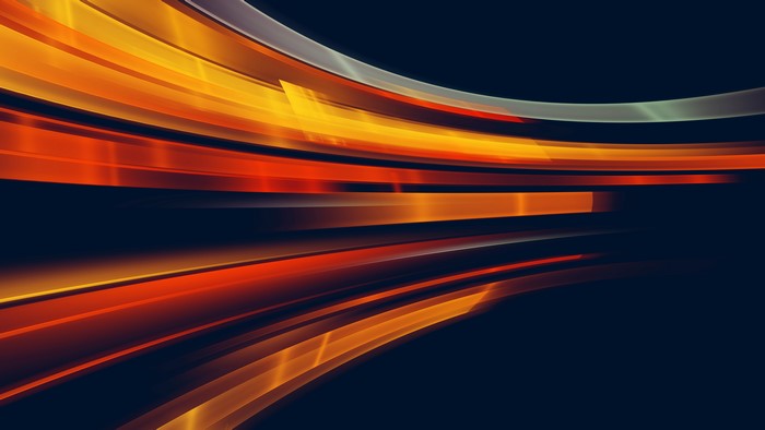 Abstract Orange and Yellow Light Streaks on Dark Background