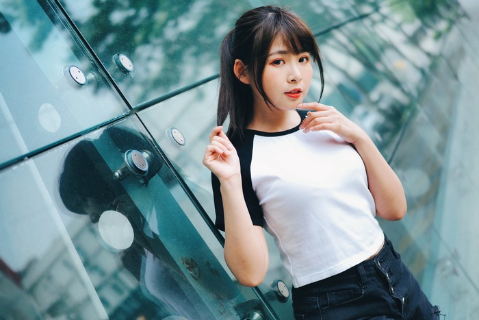 Asian Model with Brunette Hair in Black and White Shirt