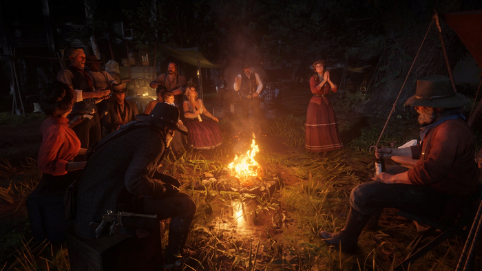 Red Dead Redemption 2 gang around a campfire