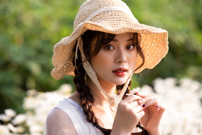 Asian Model with Braids and Straw Hat 4K