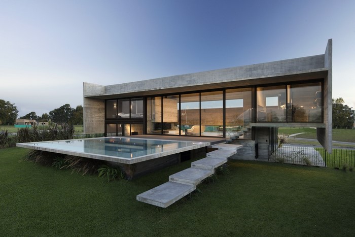 Modern concrete house with swimming pool