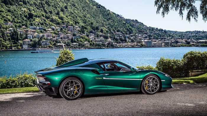 Touring Arese RH95 4K green supercar by a lake