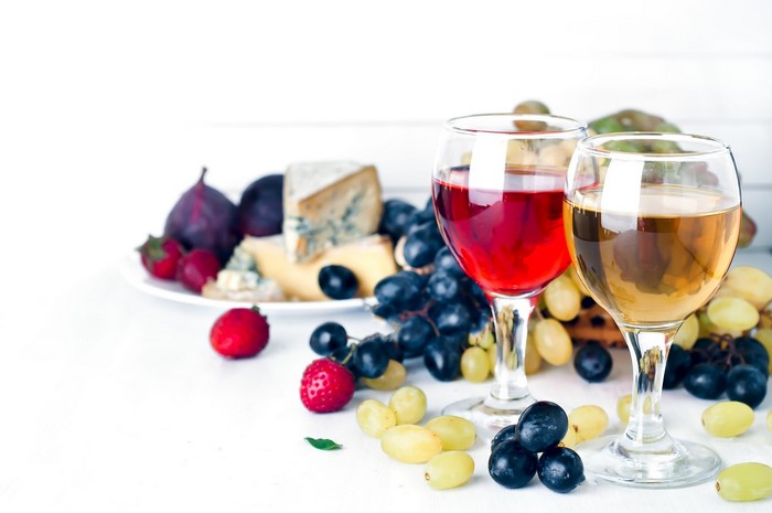 Wine and cheese platter with fruit