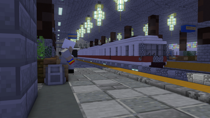 Minecraft train station with a character