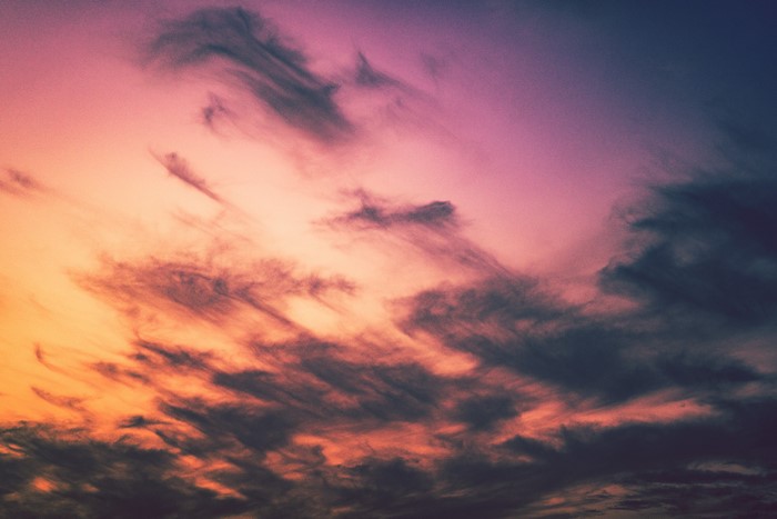 4K pink and orange sky with clouds at dusk