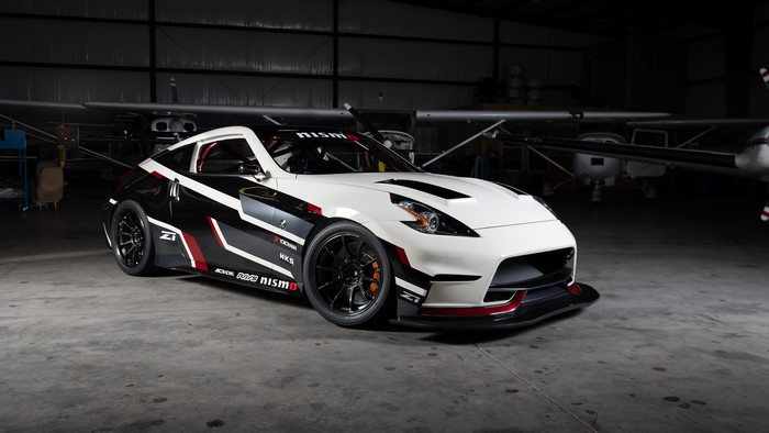 Nissan 370Z Nismo in hangar with aircraft