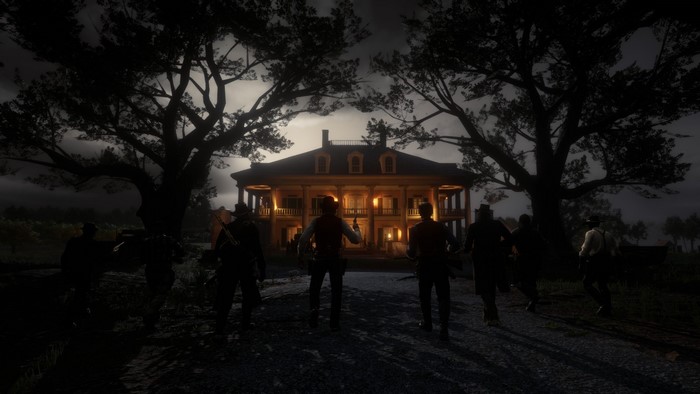 Red Dead Redemption 2 group approaching a mansion at night