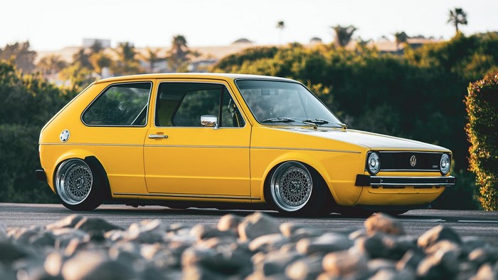 Yellow Volkswagen Golf Mk1 with custom wheels