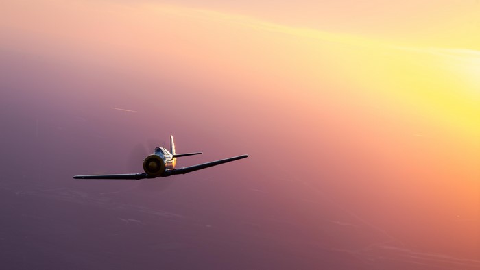 4K T-6 Texan military aircraft in sky