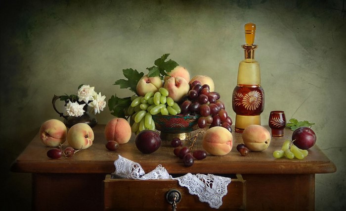 Still life with peaches, grapes, plums, and a decanter