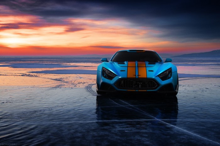 Blue Zenvo Hypercar with Orange Stripes on Ice