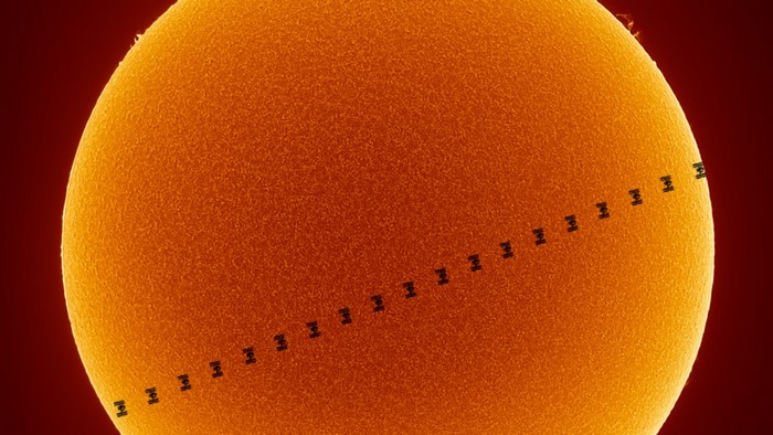 The International Space Station transits the Sun