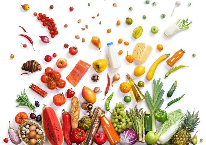 Assortment of fresh fruits, vegetables, and bread