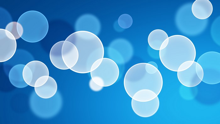 Abstract blue bokeh circles background