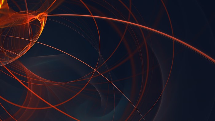 Abstract orange swirls and lines on dark background