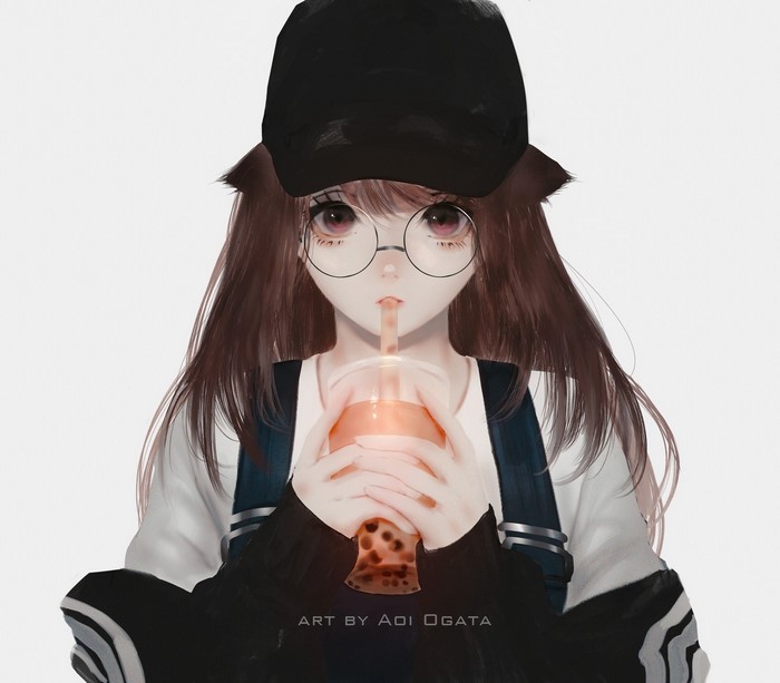 Girl with glasses and black hat drinking bubble tea