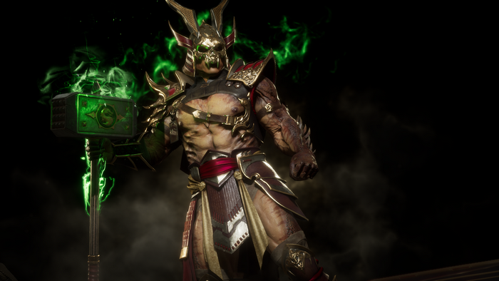 Shao Kahn holding a green glowing hammer