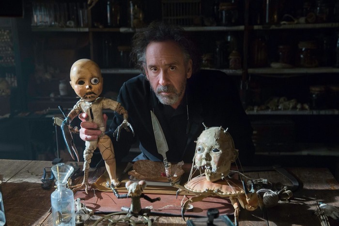 Tim Burton with his dolls