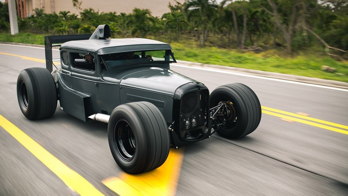 Custom Ford Hot Rod Dragster with Large Tires on Road
