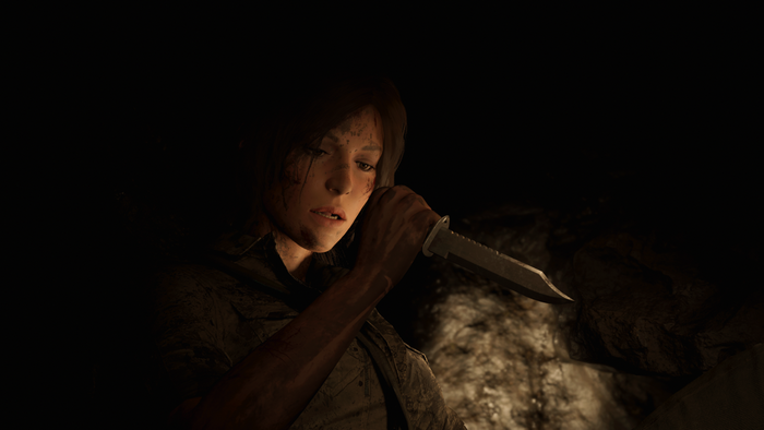 Lara Croft from Shadow of the Tomb Raider holding a knife