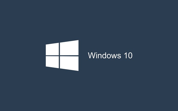 Windows 10 logo and text on a dark blue background
