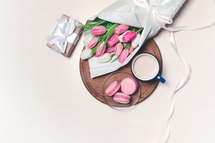 Tulips, macaroons, coffee, and a gift