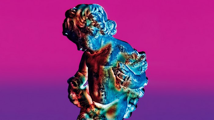Statue with purple background