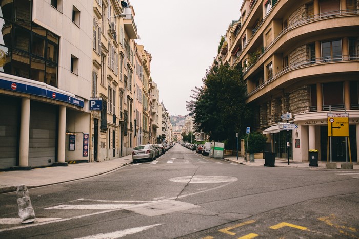Street in Nice, France with Buildings and Cars