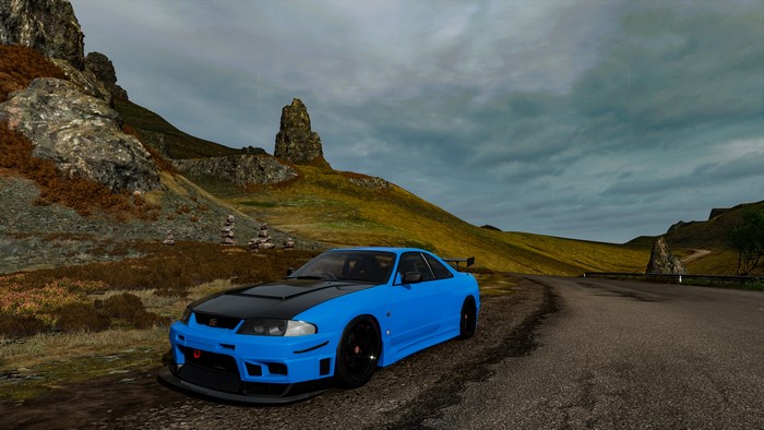 Nissan Skyline GT-R R33 on a mountain road