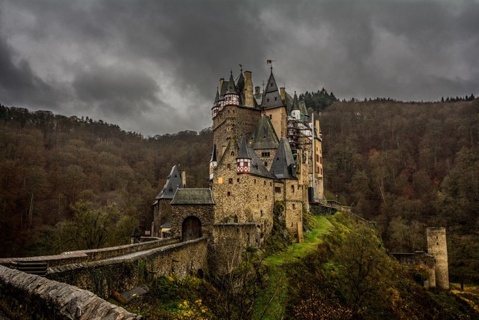 Castle Eltz on a hill with a bridge