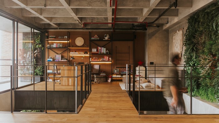 Modern loft interior with plants and bookshelves