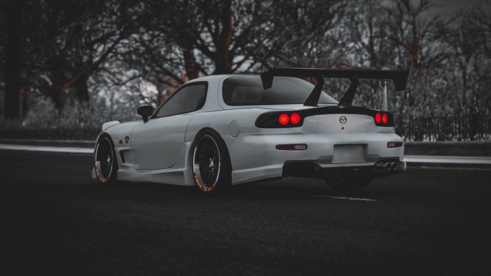 White Mazda RX-7 FD with large rear spoiler