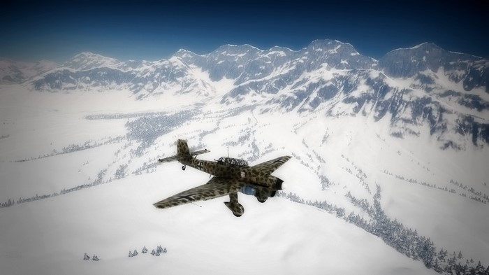 World War II aircraft flying over snowy mountains
