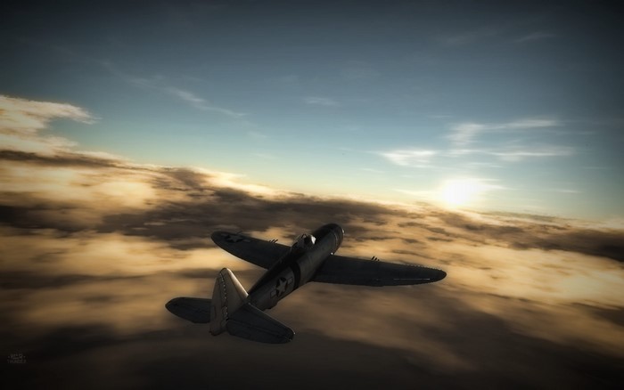 Airplane flying over clouds at sunset