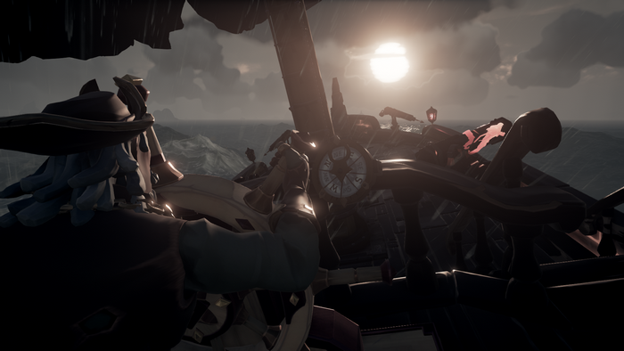Sea of Thieves: Pirate at the helm during a storm